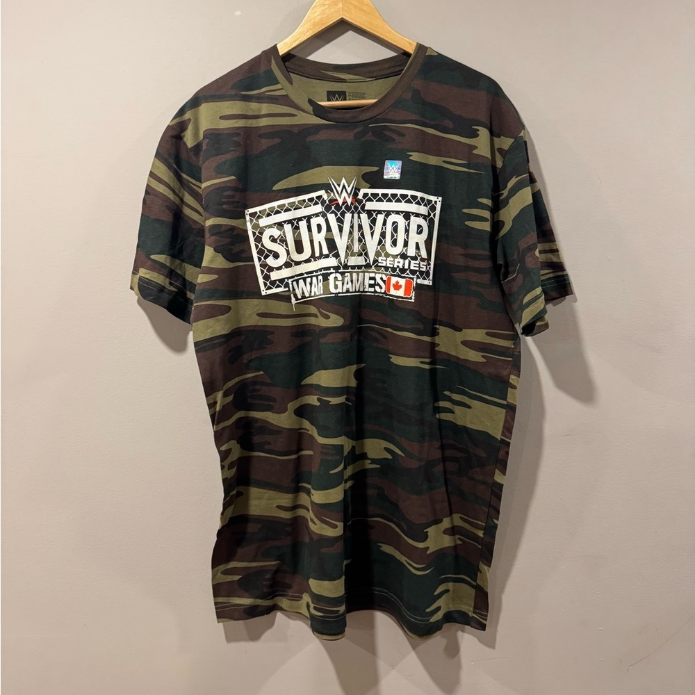 WWE Survivor Series “Retail Staff”
Wrestling T-Shirt - Rare